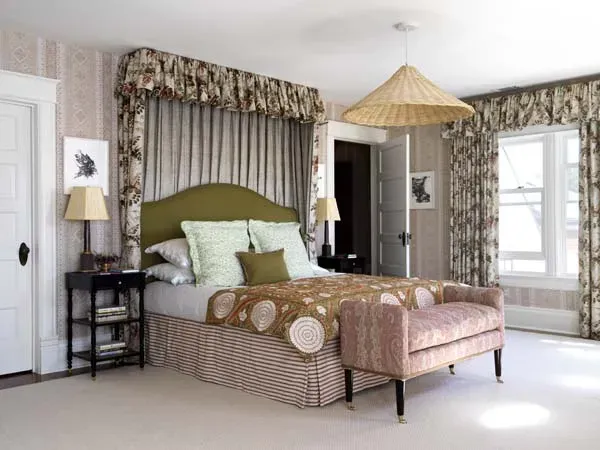 Elegant bedroom with custom drapery and window treatments